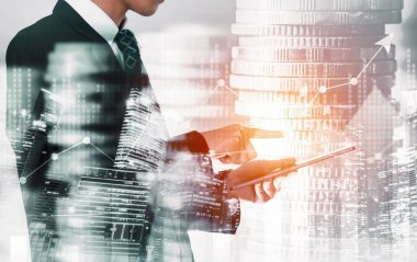 Businessman analyst working with digital finance business data graph showing technology of investment strategy for perceptive financial business decision. Digital economic analysis technology concept.
