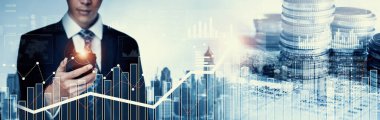Businessman analyst working with digital finance business data graph showing technology of investment strategy for perceptive financial business decision. Digital economic analysis technology concept.
