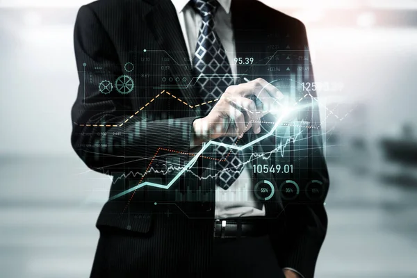 Businessman analyst working with digital finance business data graph showing technology of investment strategy for perceptive financial business decision. Digital economic analysis technology concept.