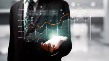 Businessman analyst working with digital finance business data graph showing technology of investment strategy for perceptive financial business decision. Digital economic analysis technology concept.