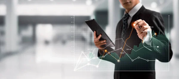 stock image Businessman analyst working with digital finance business data graph showing technology of investment strategy for perceptive financial business decision. Digital economic analysis technology concept.