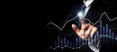 Businessman analyst working with digital finance business data graph showing technology of investment strategy for perceptive financial business decision. Digital economic analysis technology concept.