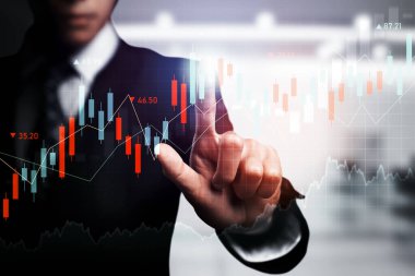 Businessman analyst working with digital finance business data graph showing technology of investment strategy for perceptive financial business decision. Digital economic analysis technology concept.