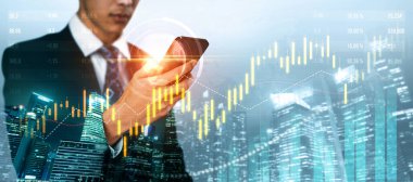 Businessman analyst working with digital finance business data graph showing technology of investment strategy for perceptive financial business decision. Digital economic analysis technology concept.