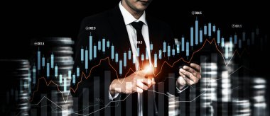 Businessman analyst working with digital finance business data graph showing technology of investment strategy for perceptive financial business decision. Digital economic analysis technology concept.