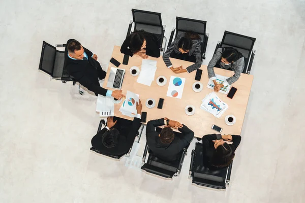 stock image Team leader encourages people in team at meeting table . Executive manager gives command to office workers in group conference . Business teamwork motivation and aspiration concept. Jivy