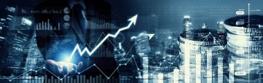 Businessman analyst working with digital finance business data graph showing technology of investment strategy for perceptive financial business decision. Digital economic analysis technology concept.
