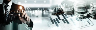 Businessman analyst working with digital finance business data graph showing technology of investment strategy for perceptive financial business decision. Digital economic analysis technology concept.