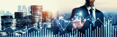 Businessman analyst working with digital finance business data graph showing technology of investment strategy for perceptive financial business decision. Digital economic analysis technology concept.