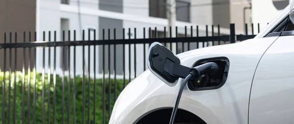 Closeup Electric Vehicle Plugged Charger Public Charging Station Powered Renewable — Photo