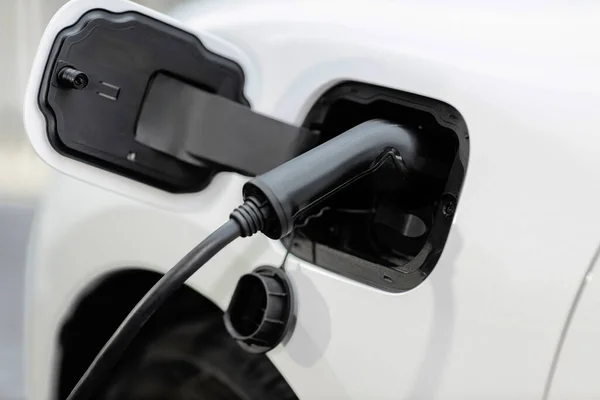 Closeup Electric Vehicle Plugged Cable Charging Station Powered Progressive Environmental — Stockfoto