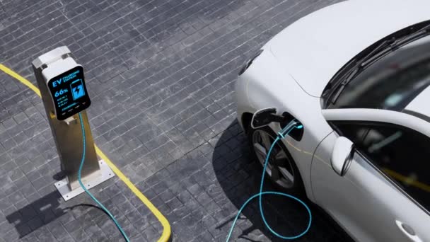 市街地公共駐車場のEv充電ステーションからの空中ビュー電気自動車充電池 代替のクリーンで持続可能なエネルギーを使用して将来の革新的な充電式Ev車 Peruse — ストック動画
