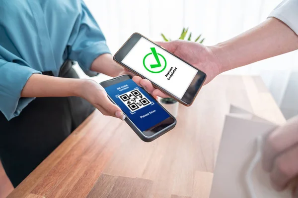 stock image Seamless cashless payments with barcode scanning on smartphone application. Utilizing QR code technology, secure and fast transactions for modern shopping lifestyle with mobile banking app. Jubilant