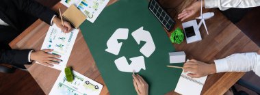 Top view business people planning and discussing on recycle reduce reuse policy symbol in office meeting room. Green business company with eco-friendly waste management regulation concept.Trailblazing clipart