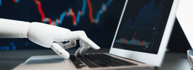 Otomatik borsa konsepti. Borsadaki finansal verileri analiz eden robot el, borsadaki fiyat değişikliğini tahmin etmek için yapay zeka kullanımı. Önde.