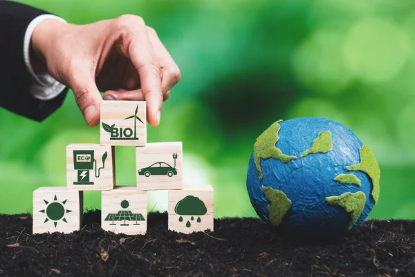 Hand Businessman Holding Earth Symbolizing Green Business Utilizing Biofuel Technology — Stock Photo, Image