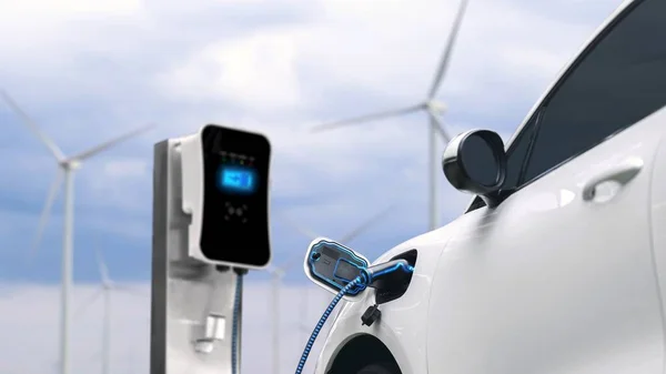 在具有自然室外背景的风力涡轮机场 采用智能电动汽车充电器从充电站充电站充电 替代清洁可持续能源的技术进步 仔细阅读 — 图库照片