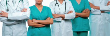 Doktor hemşire ve sağlık uzmanlarından oluşan kendine güvenen tıbbi ekip hastane ya da klinikteki uzmanlar. Panoramik pankartta tıbbi ve sağlık hizmetleri topluluğu. Neoterik