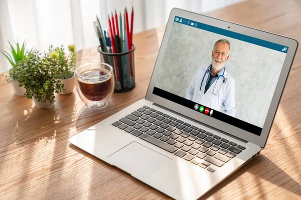 Doctor video call online by modish telemedicine software application for virtual meeting with patient
