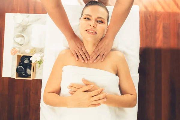Panorama top view woman customer enjoying relaxing anti-stress spa massage and pampering with beauty skin recreation leisure in day light ambient salon spa at luxury resort or hotel. Quiescent