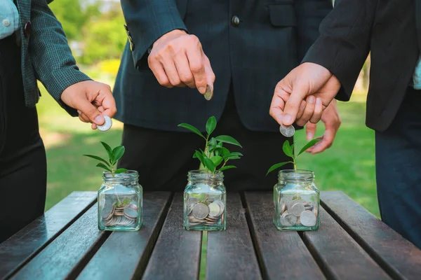 Business People Put Coin Money Saving Glass Jar Outdoor Table — Stock Photo, Image