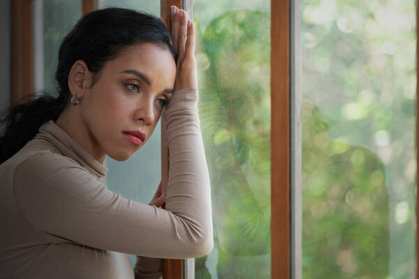 Depressed young Black woman with mental health problem in mind need crucial treatment from overthinking fatigue girl, disruptive thought, dissocial, anxiety and other mental health disorders .