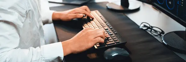 Office Worker Sitting Workspace Desk Focused Engaged Using Computer Typing — Stock Photo, Image
