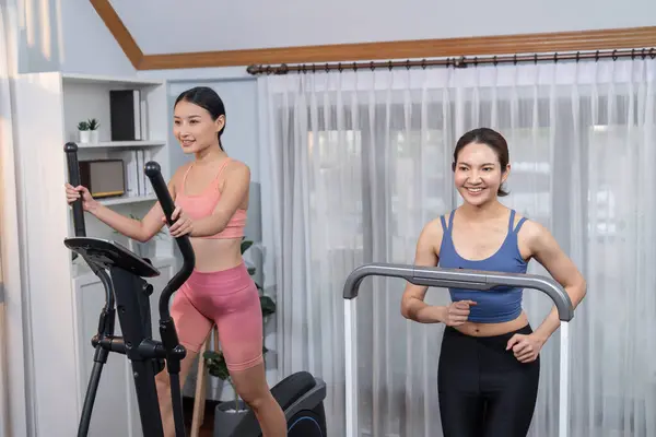 Energetic Strong Athletic Asian Woman Running Elliptical Running Machine Home — Stock Photo, Image