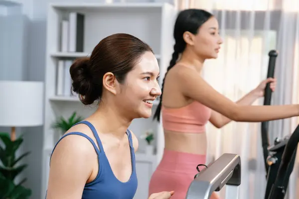 Energetic Strong Athletic Asian Woman Running Elliptical Running Machine Home — Stock Photo, Image