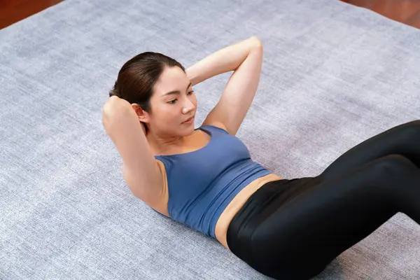 Young Attractive Asian Woman Sportswear Lies Floor Doing Sit Ups — Stock Photo, Image
