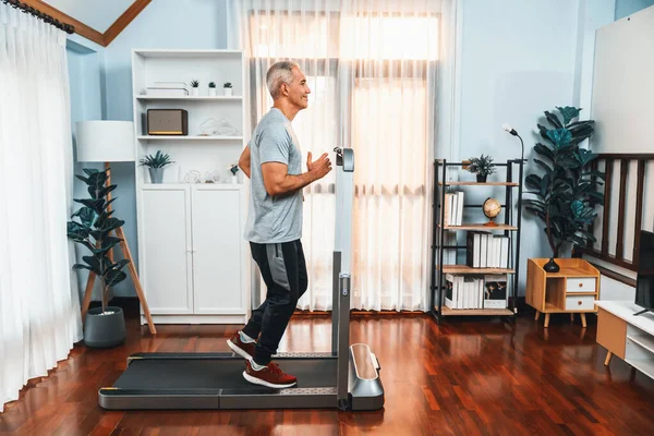 Active Senior Man Running Tread Running Machine Home Together Full — Stock Photo, Image