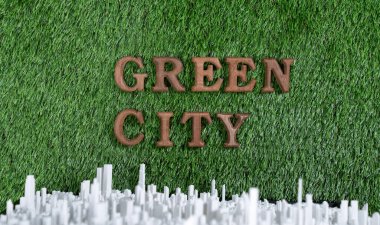 Çevre bilinci kampanyası mesajı Green City 'de şehir manzarası arka planına sahip biyofilik yeşil çimenler üzerinde düzenlendi. Sürdürülebilir gelecek için çevresel sosyal yönetim fikri. Döngü