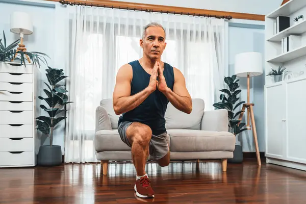 Active Fit Senior Man Warmup Stretching Using Furniture Home Exercising — Stock Photo, Image