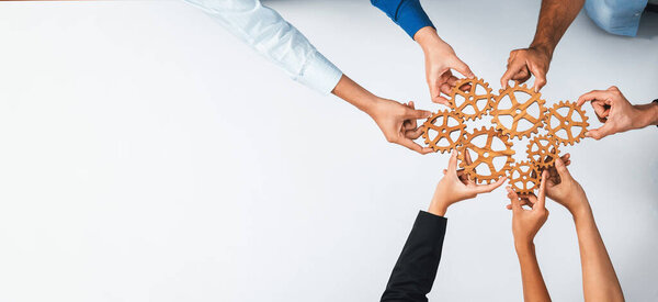 Top panorama banner of business team joining cogwheel in circular together symbolize successful group of business partnership and collective teamwork in workplace with productive efficiency. Prudent