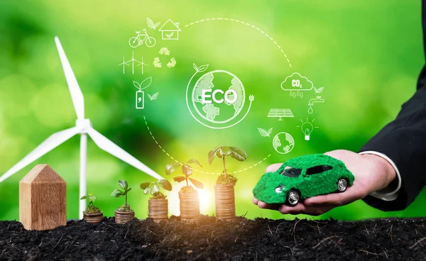 Growing money or coin stack with business investor invest in net zero electric car using sustainable and alternative energy. Electric vehicle and automobile market growth from eco investment. Reliance