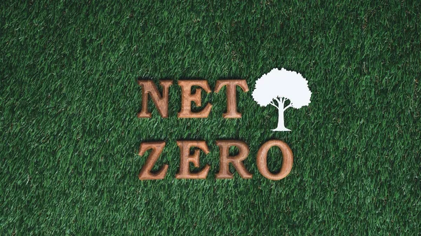 Environmental awareness campaign showcase message arranged in Net Zero on biophilic green grass background. Environment friendly with reduce CO2 emission concept for sustainable and green future. Gyre