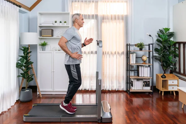 Active Senior Man Running Tread Running Machine Home Together Full — Stock Photo, Image