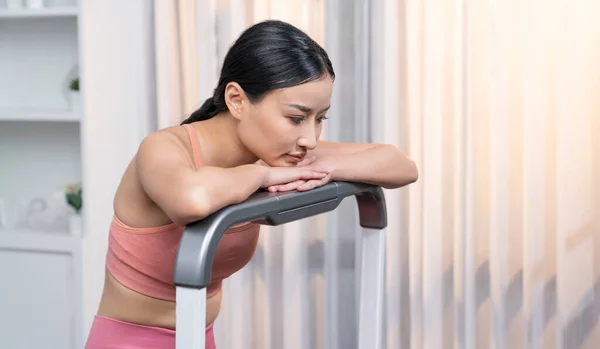 Energetic Strong Athletic Asian Woman Resting Elliptical Running Machine Home — Stock Photo, Image