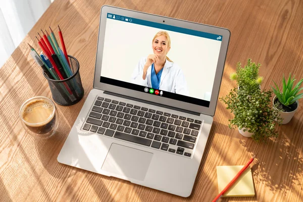 Doctor video call online by modish telemedicine software application for virtual meeting with patient