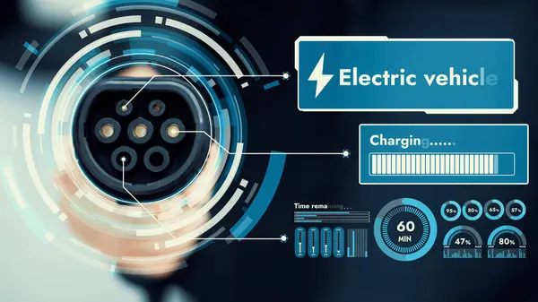 stock image Focus EV charger pointing in front of camera display smart digital battery status hologram with blur businessman background. EV car charger using alternative clean energy reducing CO2 emission. Peruse