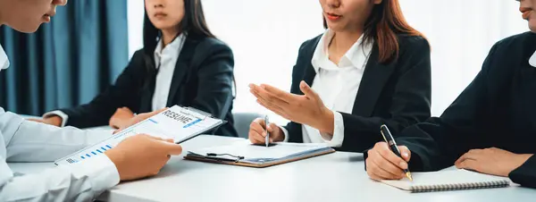 Candidate in job interview with human resources manager at office desk having oratory conversation for search person to fill vacant hiring position . Professional HR specialist interview candidate .