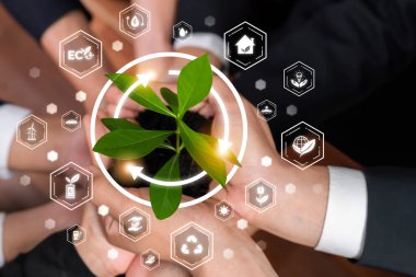 Karbon ikonu ile birlikte büyüyen ya da beslenen iş ortaklığı ESG sürdürülebilir çevre korumasını, ekolojik teknoloji ve net sıfır gelecek için karbon kredi çözümünü sembolize etmektedir. Boşluk