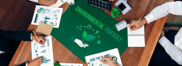 Top view green company meeting on environmental awareness and ecological protection regulation implementing to reduce CO2 emission and save Earth as responsible and eco-friendly company. Trailblazing
