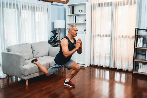 Active Fit Senior Man Warmup Stretching Using Furniture Home Exercising — Stock Photo, Image