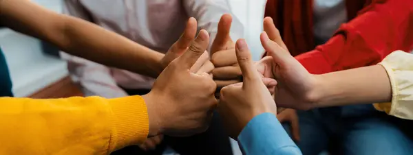 stock image Startup company employee team stacking hand together symbolize successful group of business partnership and strong collective unity teamwork in community workplace in panoramic banner. Synergic