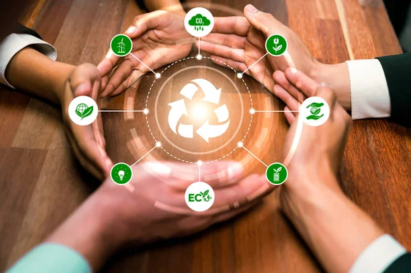 Business partnership form circular hand together around recycle icon symbolize ESG sustainable environment and ecosystem protection with eco recycling technology and waste reduction. Reliance