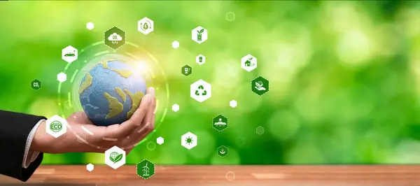 Businessman holding Earth with eco friendly icon design symbolize business company commitment to protect planet Earths ecosystem with net zero technology and ESG practice. Panorama Reliance