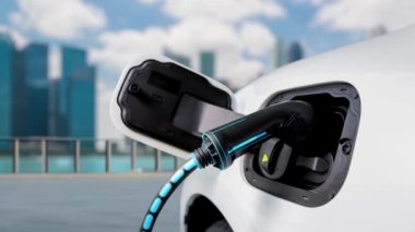 Elektrikli araba şarj istasyonuna bağlanıp şehrin arka planında akıllı dijital batarya durumu hologramıyla şarj edilecek. Geleceğin yenilikçi çevre dostu enerji sürdürülebilirliği. İnceleyin