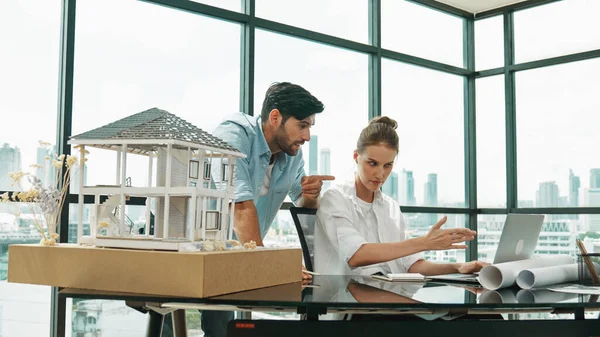 Smart Architect Engineer Inspect House Model While Colleague Using Laptop — Stock Photo, Image