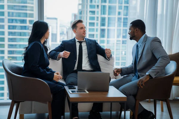 Group of diverse executive investor listening businessman talking about investment. Professional business team discussing about business plan, statistic, marketing strategy at office. Ornamented.